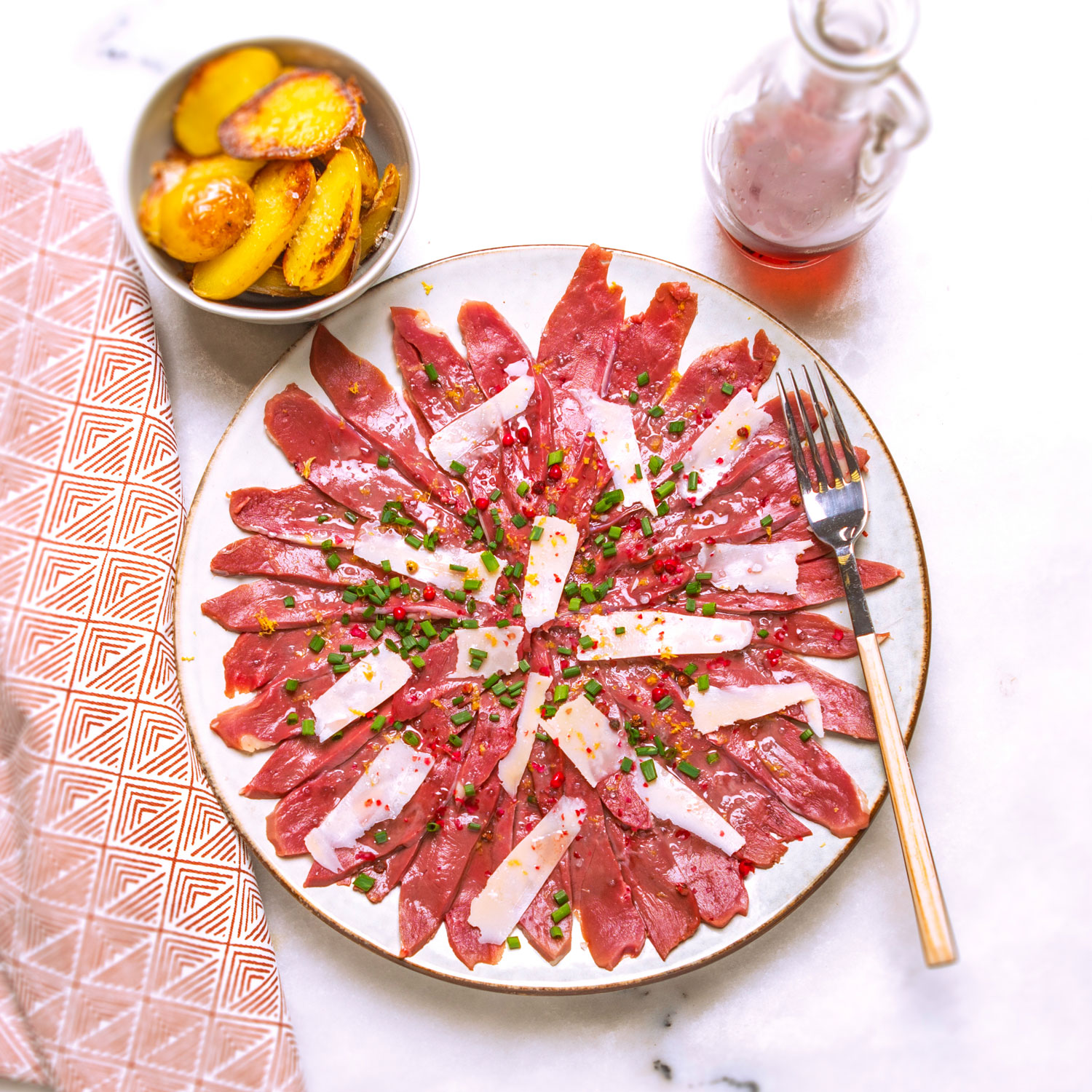 Carpaccio De Canard Au Vinaigre De Framboise Et Poivre Rose